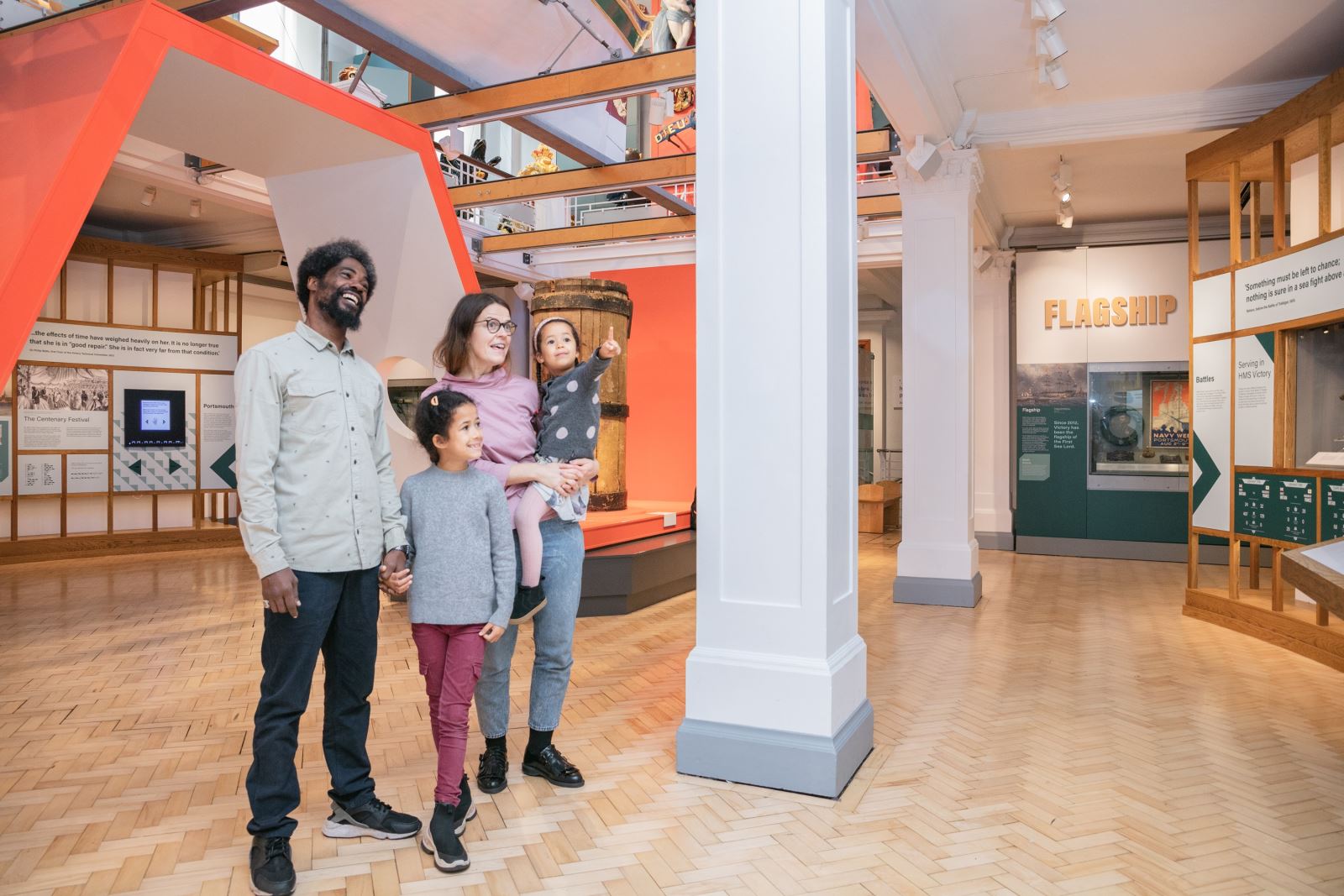 A family exploring the Victory Gallery